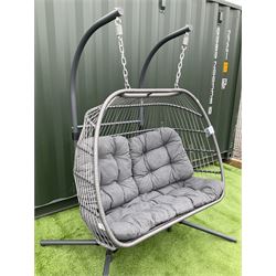 Metal and wicker two seat garden swing, with cushion - THIS LOT IS TO BE COLLECTED BY APPOINTMENT FROM DUGGLEBY STORAGE, GREAT HILL, EASTFIELD, SCARBOROUGH, YO11 3TX