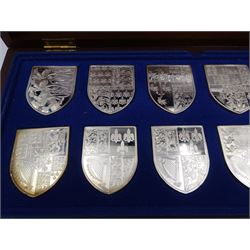 Yorkshire Mint, The Royal Arms Collection, twelve shield shaped silver medallions each depicting variations on the Royal coat of arms, each hallmarked Yorkshire Mint, Birmingham 1976/77, contained within fitted wooden case with associated information cards