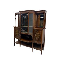 Victorian hardwood and inlaid display cabinet, central breakfront glazed display with astragal glazing and mirror back, flanked by mirrored alcoves with turned supports, below foliate and scrolling marquetry panels enclosing cupboard doors, shaped open shelves with turned supports beneath, on tapered and spade feet