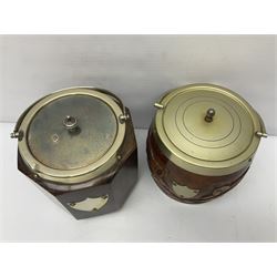 Four early 20th century carved oak biscuit barrels with silver-plated mounts 