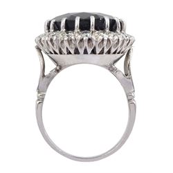 18ct white gold large oval sapphire and round brilliant cut diamond cluster ring, sapphire approx 27.35 carat, total diamond weight approx 1.00 carat