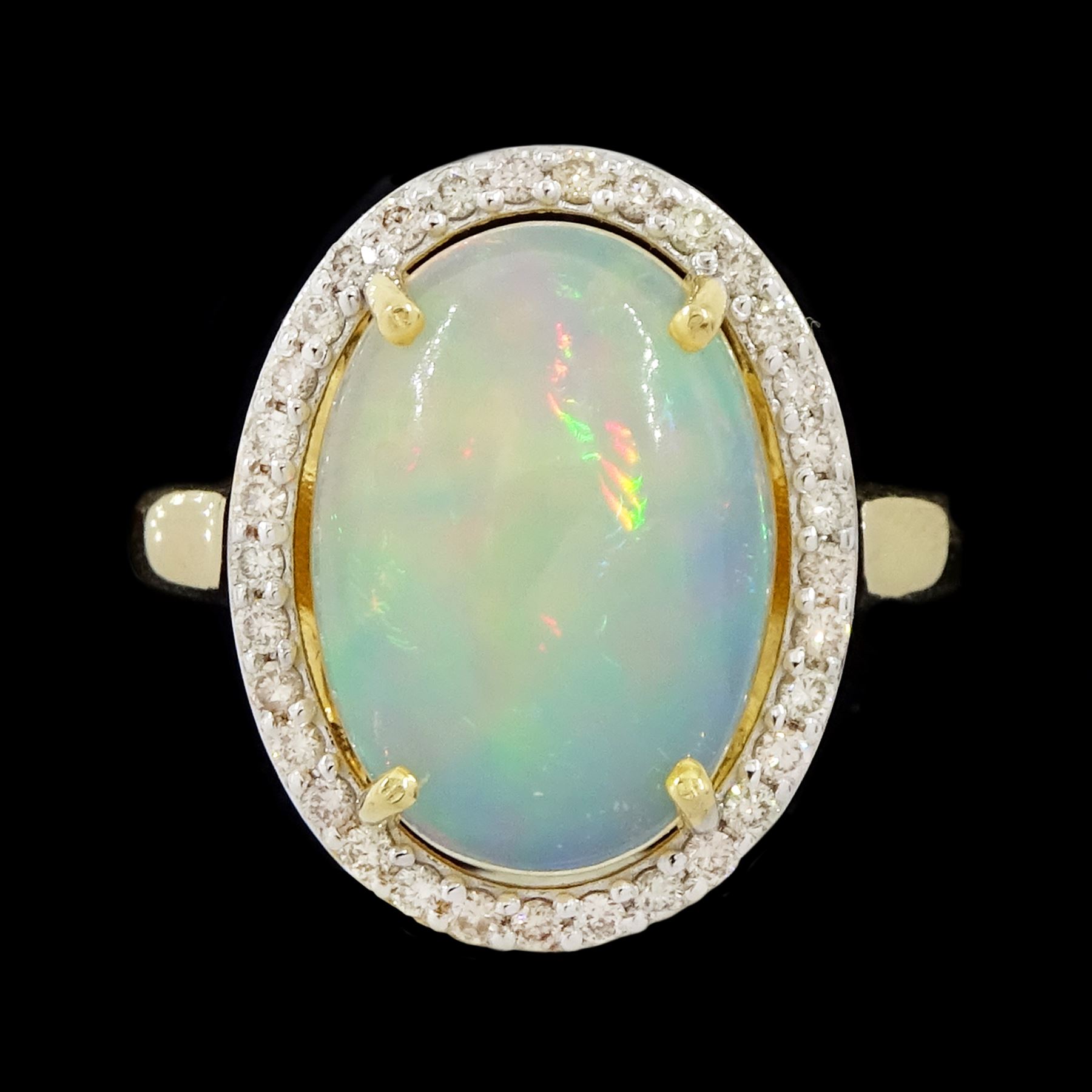 14ct gold opal and diamond cluster ring, single cabochon cut opal of approx 2.80 carat, with round brilliant cut diamond surround, stamped, total diamond weight approx 0.35 carat