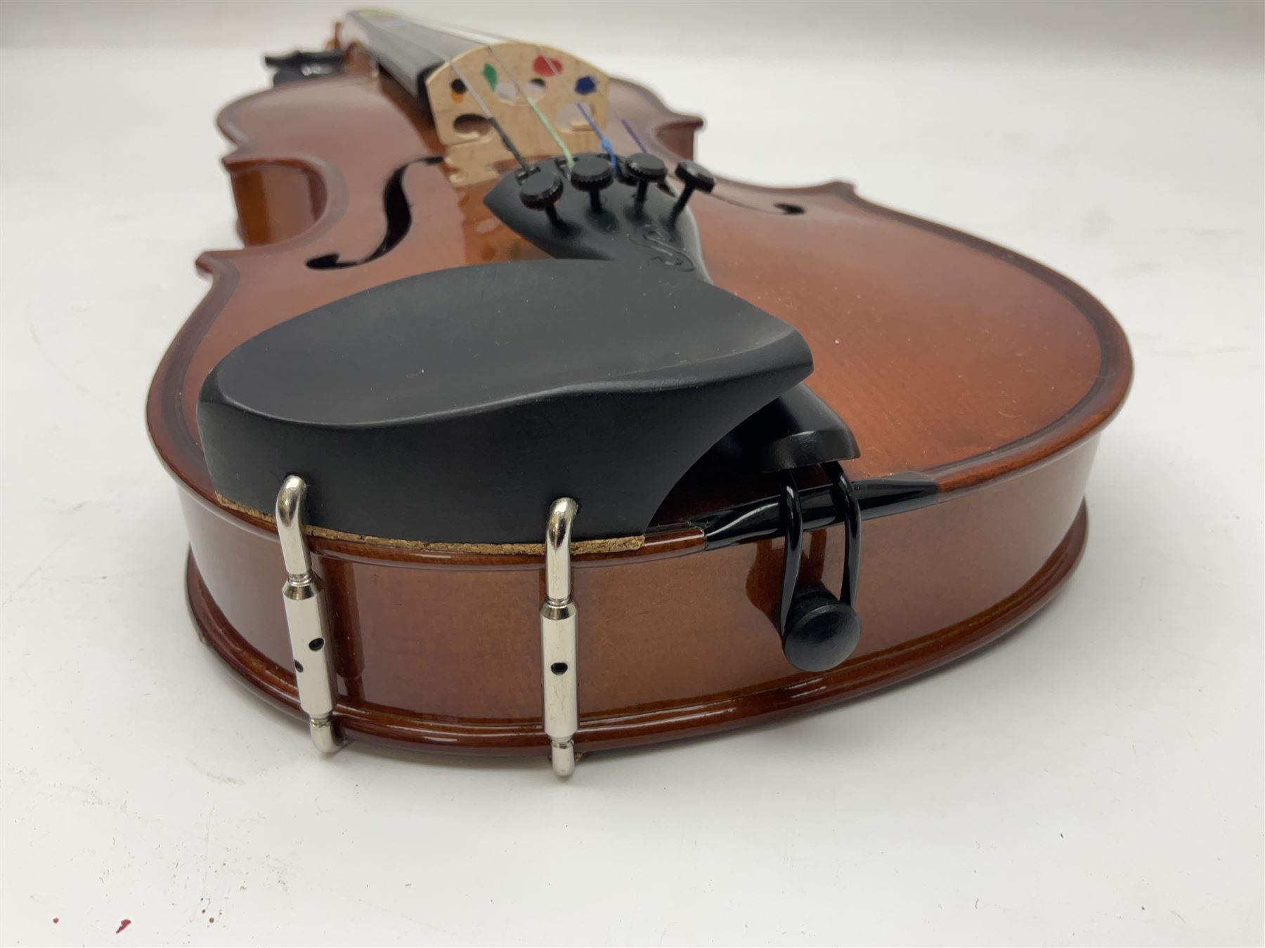 Four student violins - two Chinese three-quarter size with 33.5cm and 34cm two-piece backs; Stringers of Edinburgh quarter size with 28cm two-piece back; and Stentor quarter size with 28cm two-piece back; each in carrying case (4)