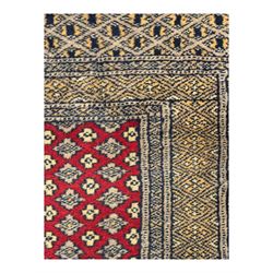 Pakistani Kashan hand-knotted rug with a central medallion and intricate geometric floral patterns, set against a red field and framed by a multi-band border (156 x 94cm); Pakistani Kashan rug with a repeating floral motif across the red field, enclosed by a detailed geometric border in complementary tones (162 x 95cm)
