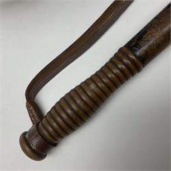 Police - Victorian turned hardwood truncheon with traces of decoration and VR cypher L42cm; Humberside Police helmet with Queens Crown helmet plate; hand lamp inscribed 'The Inspector'; and small pair of pewter figures of police officers (5)