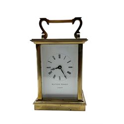 Matthew Norman-20th century brass cased carriage clock with an enamel dial, roman numerals...