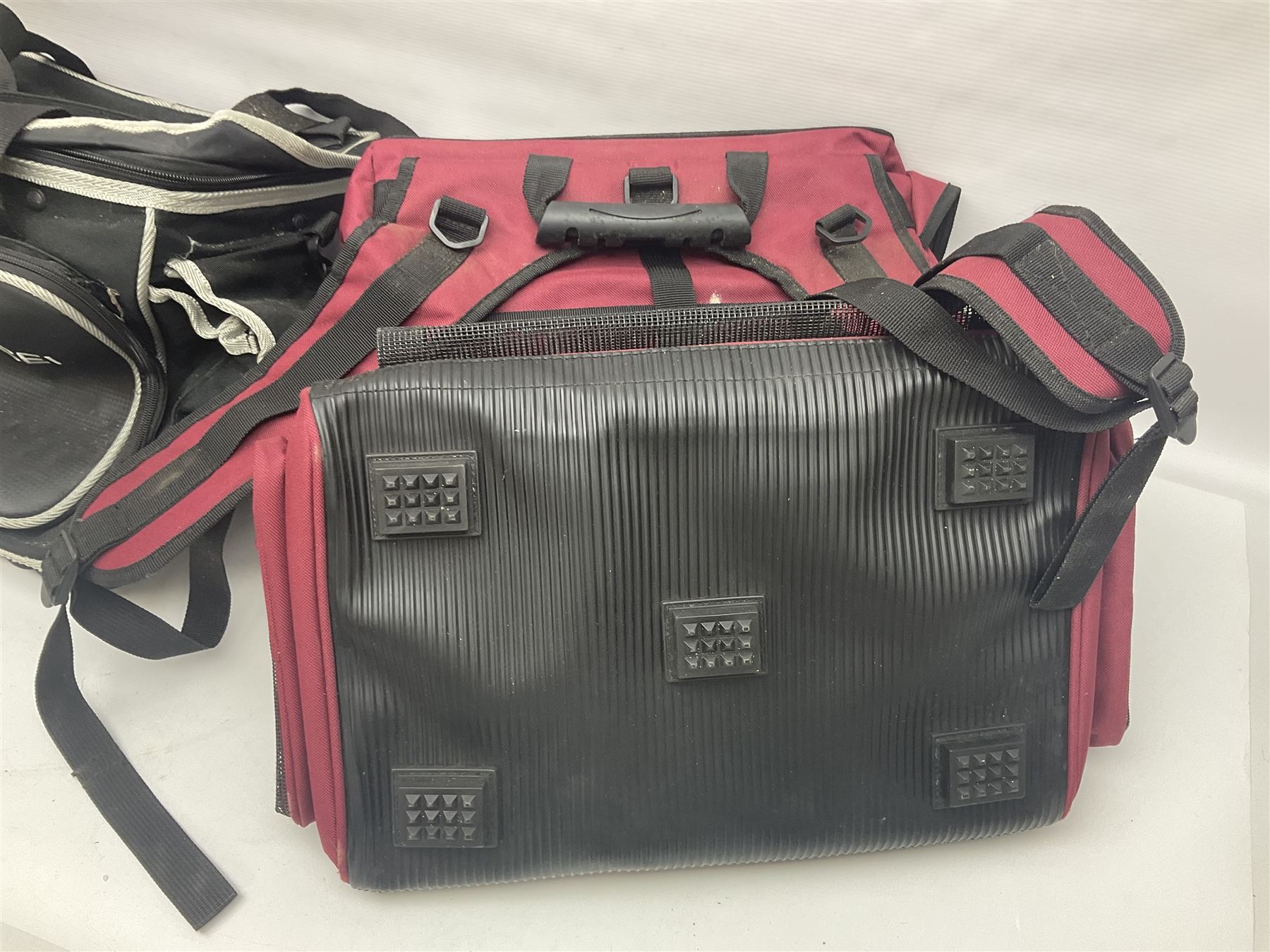 Collection of fishing memorabillia and equipment, including an Allcocks three piece split cane trout fly rod, Shakespeare Salt 3600 surf rod, two tackle bags, Old Red Seastreak multiplier reel, Sportext Saltwater fixed spool reel, fishing dvds, etc