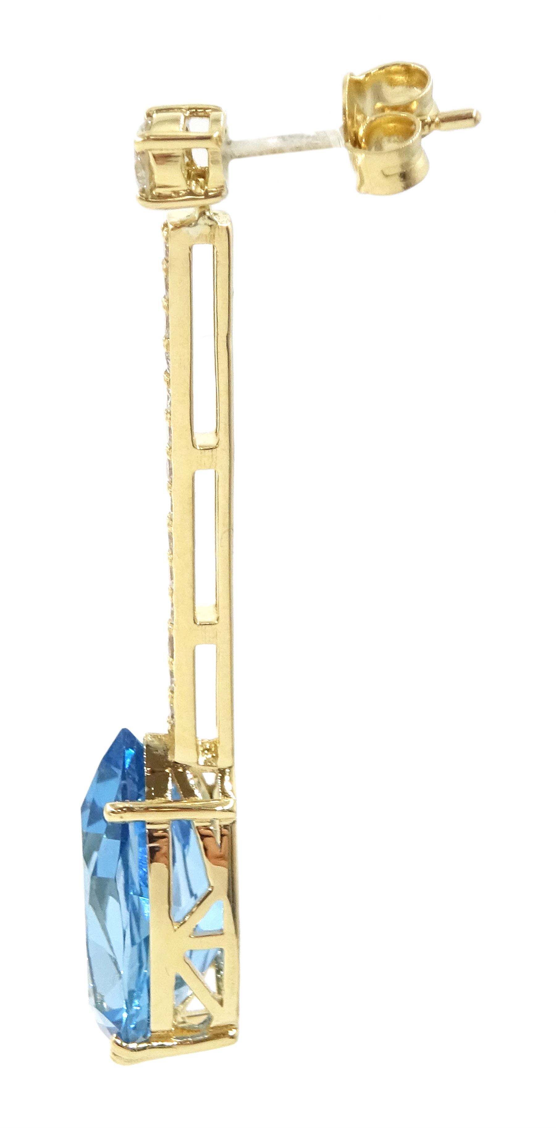 Pair of 18ct gold Swiss blue topaz and diamond earrings, each stud set with a single pear cut topaz, suspending from a row of round brilliant cut diamonds, total topaz weight approx 15.45 carat, total diamond weight approx 0.75 carat