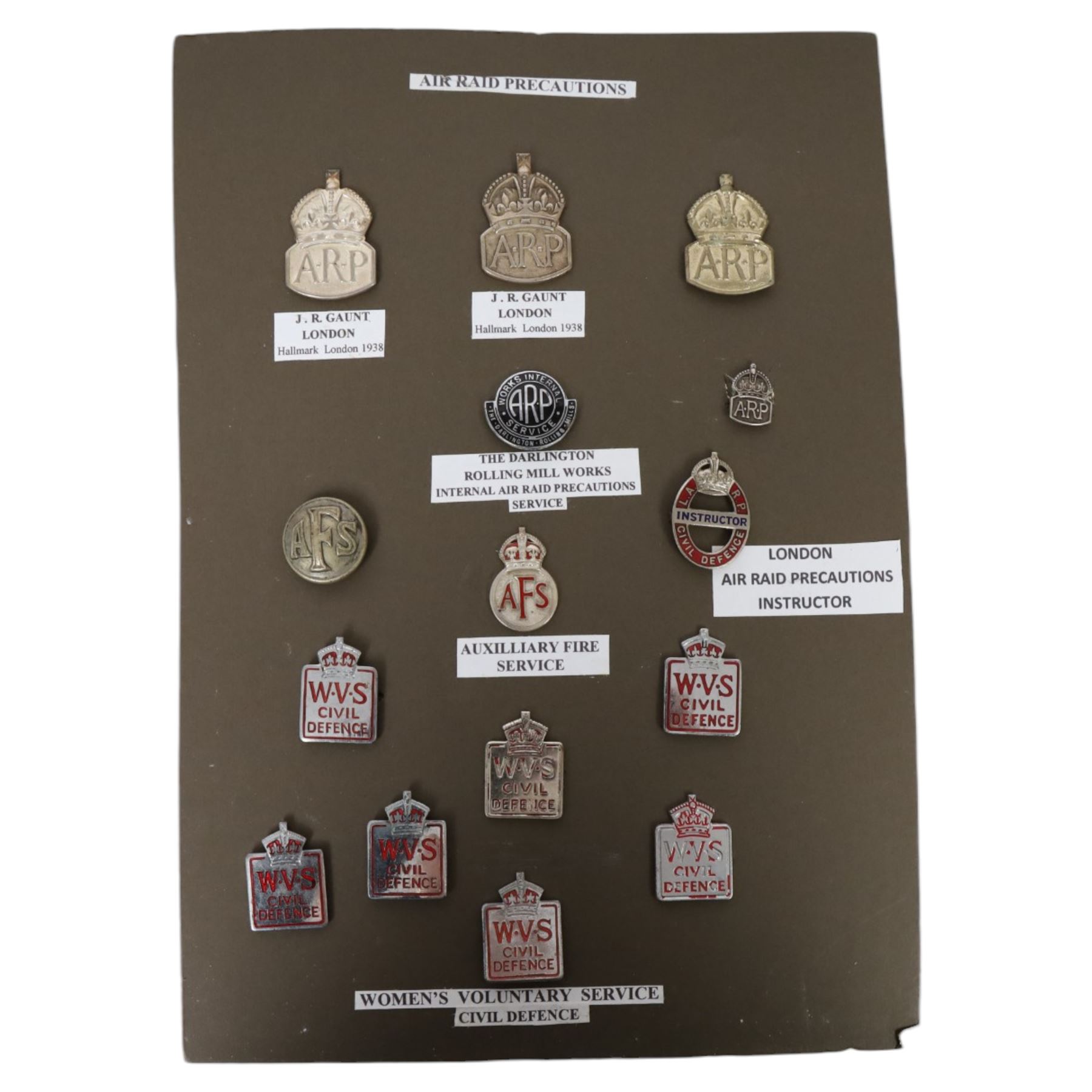 Air Raid Precautions items, including four door plates, silver lapel bedges, Women's Voluntary Service, whistle, matchbox etc  