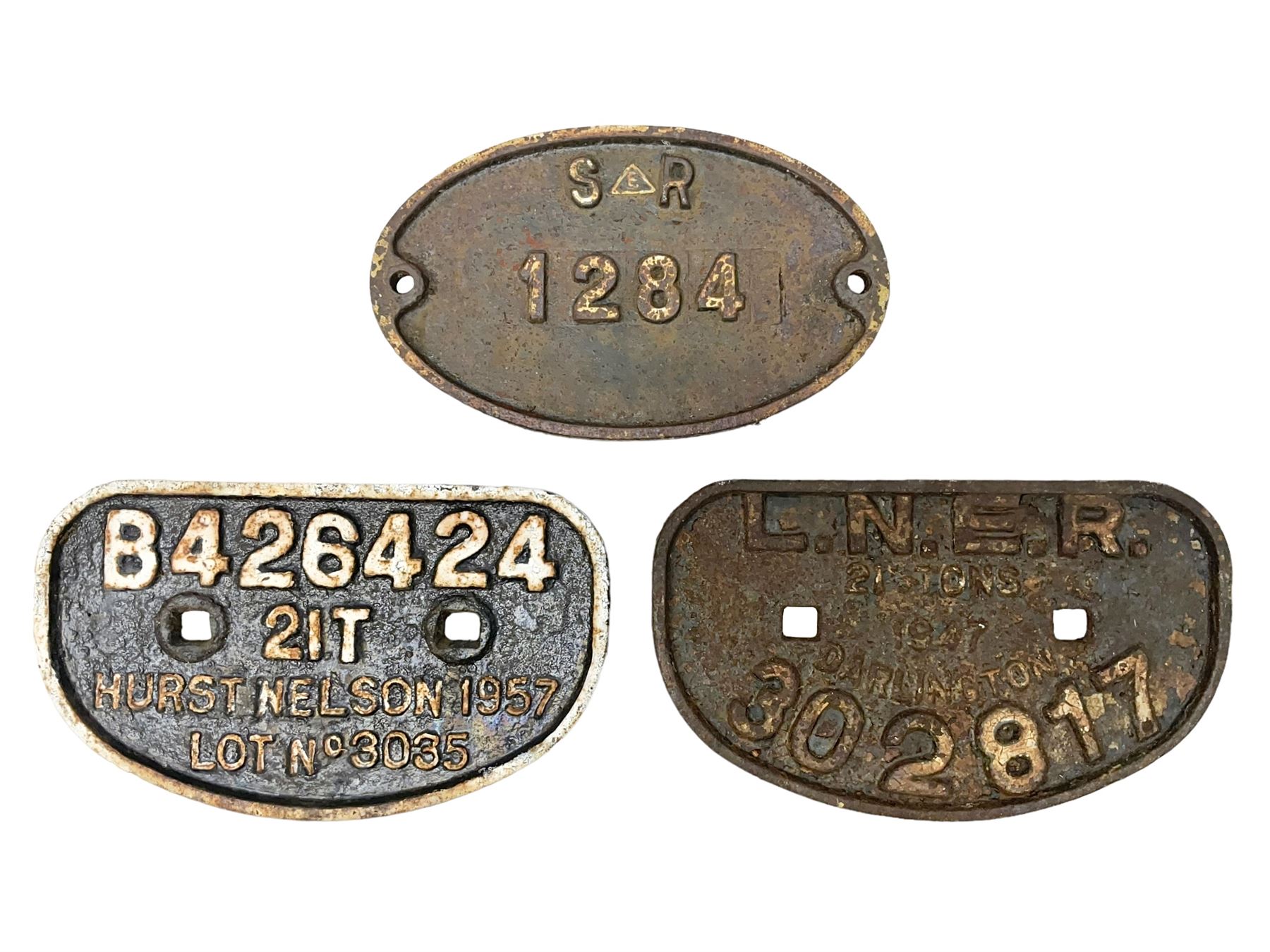 'LNER, 21 tons, 1947, Darlington, 302871' cast iron sign, together with BR D type Wagon plate, 'B426424 Hurst Nelson 1957 Lot No 3035' and another cast iron plaque