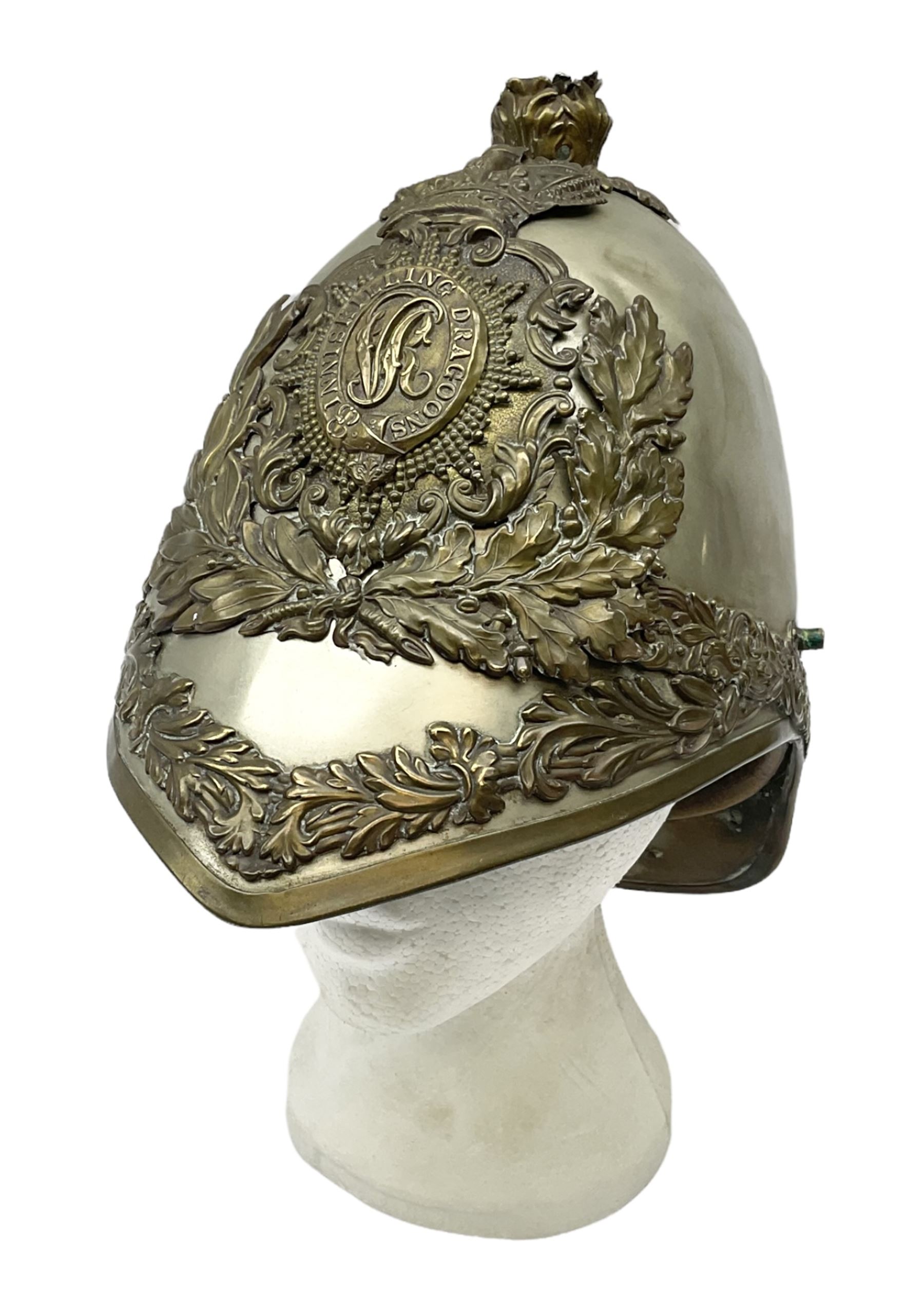 Victorian 1847 Pattern Officer's Helmet of the Inniskilling Dragoons, the white metal skull with gilt fittings including VR cypher to the plate; with leather liner H24cm