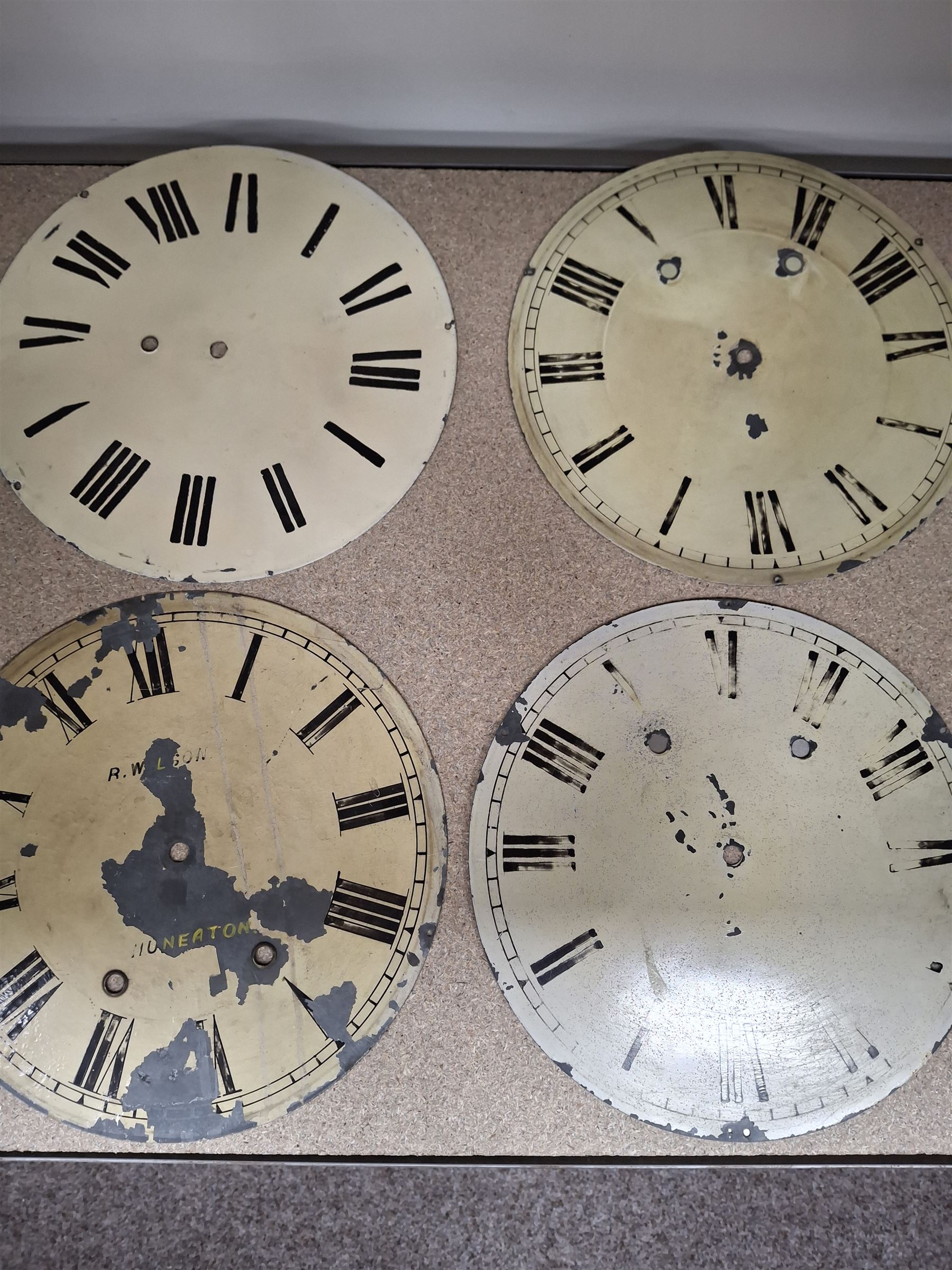 Approximately twenty-two longcase and wall clock dials, 18th century and later, included painted and brass examples