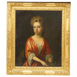 Follower of Sir Godfrey Kneller (German/British 1646-1723): Portrait of a Girl Wearing a Satin Pink Dress, 18th century oil on canvas unsigned 73cm x 61cm, housed in heavy gilt foliate moulded frame, overall 95cm x 83cm