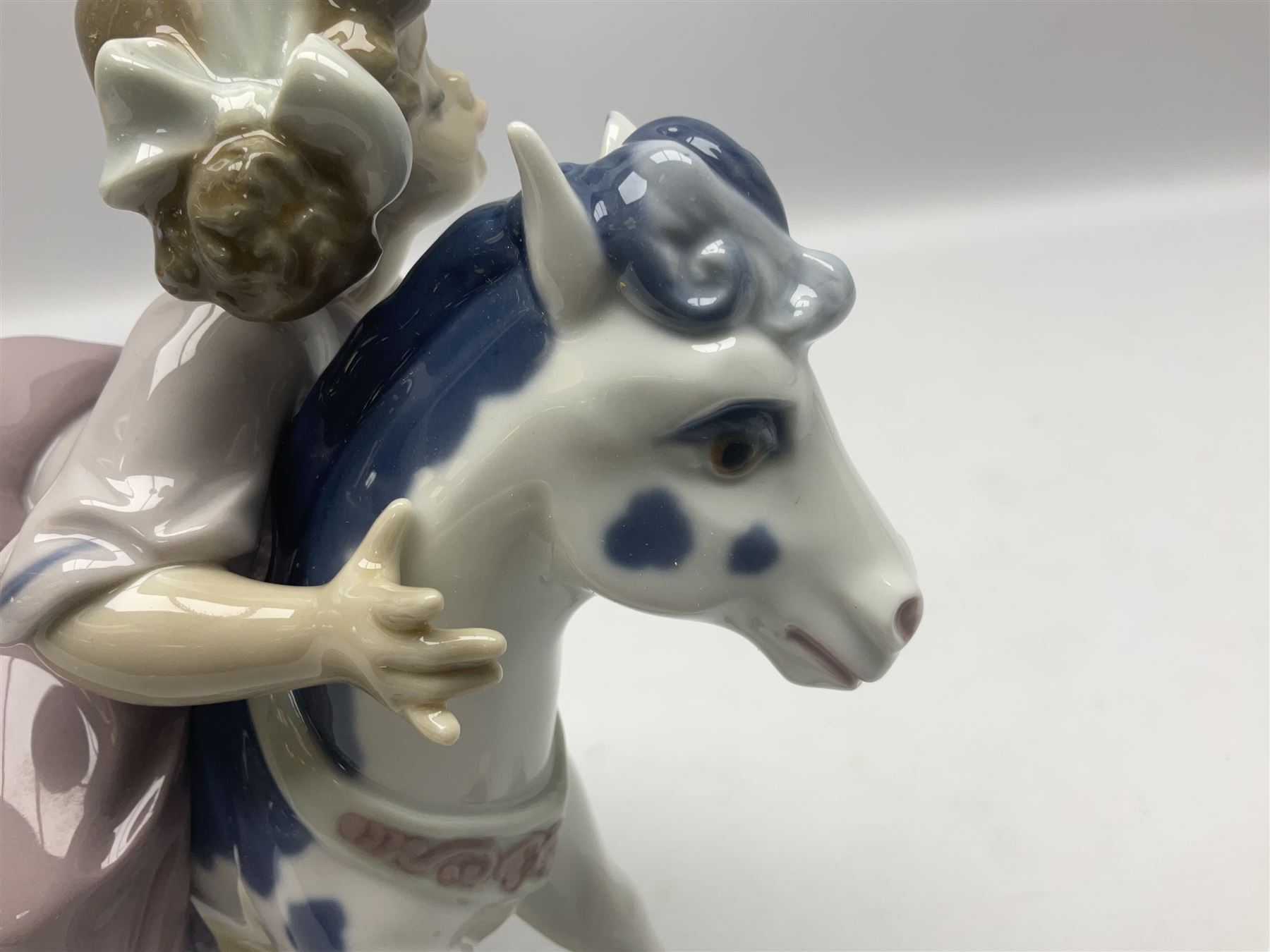 Three Lladro figures, Faithful Steed no 5769, Best Foot Forward no 5738 and Lambkins no 5469, all with original boxes, largest example H21cm 