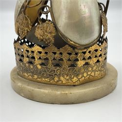 Victorian evening dinner bell, with three mother of pearl shells, floral and grape gilt decoration, and bird finial, raised upon a circular soapstone base with gilt pierced gallery, H14cm