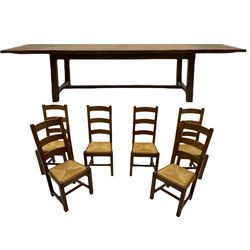 Antix French oak dining table with two leaves, two frieze drawers;, and six ladder back chairs with rush seats