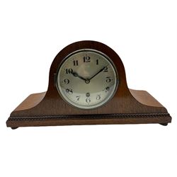 A light oak cased Tambour clock with a German 8-day movement sounding the quarters and hours on gong rods, with a 6” silvered dial , Arabic numerals and minute track, steel spade hands within a spun brass bezel and convex glass.
With pendulum. 








