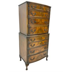 Mid-20th century walnut bow-front chest on chest, fitted with eight graduating drawers, on cabriole feet
