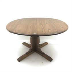 Ercol elm Old Colonial extending pedestal dining table with single leaf (W115cm and 165cm, H73cm, D115cm) and set six hoop back dining chairs (W43cm) 