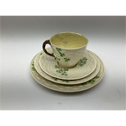 Two Royal Crown Derby pattern Imari soup bowls, pattern 2451, Belleek Fermanagh Ireland four piece set in green shamrock pattern, Royal Doulton small lady figure, Marie HN1370, large Wedgwood fruit bowl, Sylvac jardiniere in autumn leaves pattern, five pieces Co-operative Society commemorative ceramics, with selection of other ceramics. 