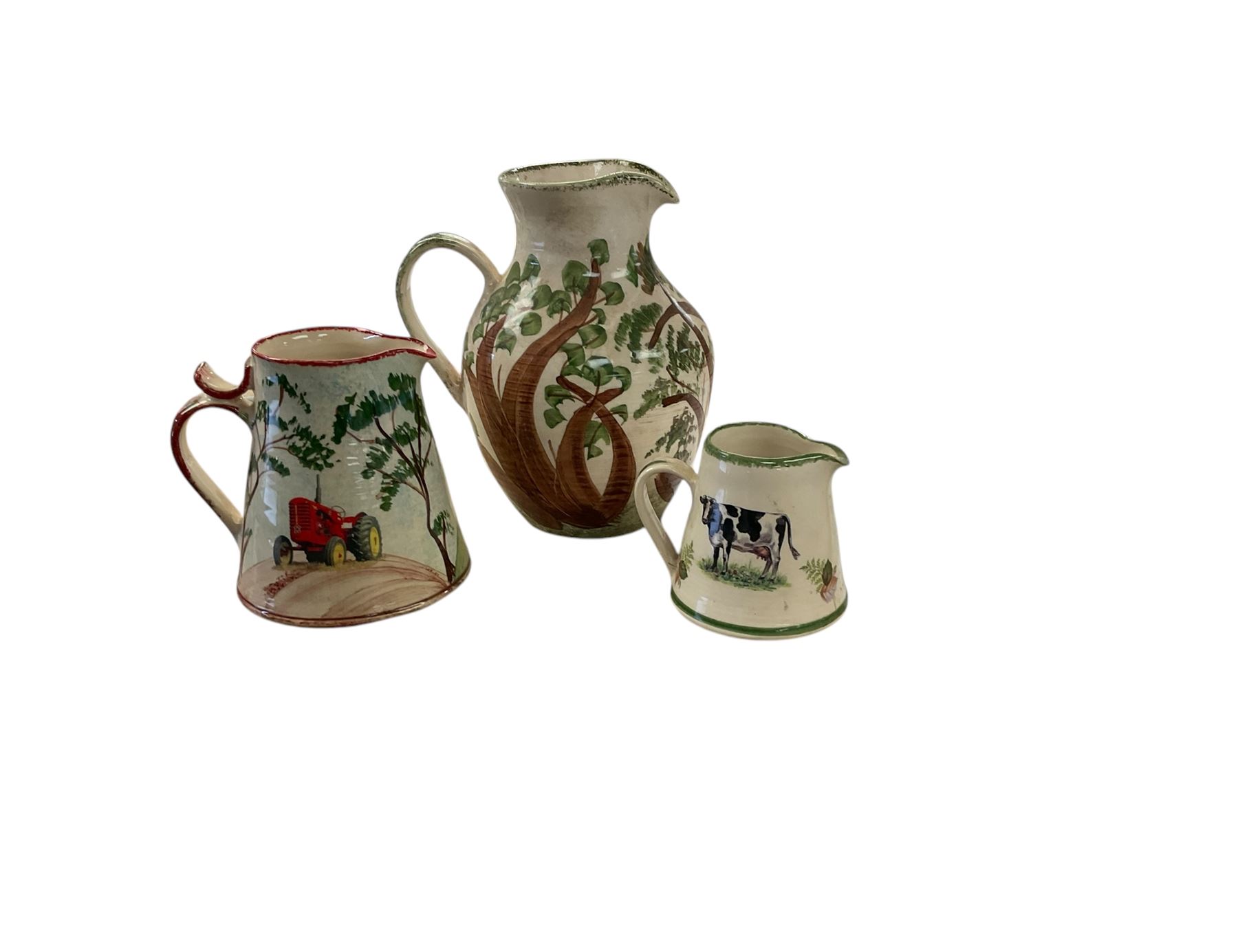 Three Yorkshire Moorland pottery jugs, together with other ceramics and collectables in two boxes  