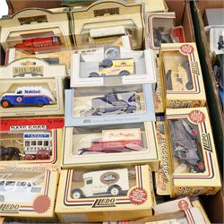 Approximately 80+ boxed die cast vehicles by Lledo, including Days Gone models, and a folder of collectors catalogues from 1989 onwards, contents in two boxes