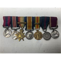 George V Military Medal and Distinguished Conduct Medal miniature group of seven medals comprising MM, DCM, WW1 trio including 1914 Star with date clasp and MID leaves, The Great Durbar Delhi 1911 Medal and LSGC; on pinned wearing bar; WW1 Military Medal miniature group of three comprising MM, BWM and Victory; Victoria North West Canada 1885 miniature; and George VI miniature Territorial Efficiency medal; all with ribbons
