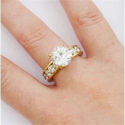 18ct gold single stone old cut diamond ring of approx 2.80 carat, with eighteen round brilliant cut diamond set shank of approx 3.00 carat, total diamond weight approx 5.80 carat