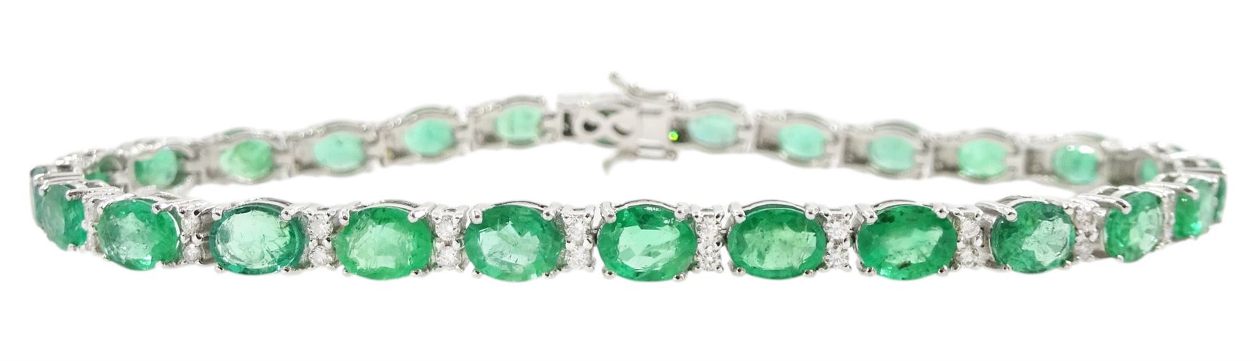 18ct white gold oval cut emerald and round brilliant cut diamond bracelet, stamped, total emerald weight 7.45 carat, total diamond weight 0.48 carat