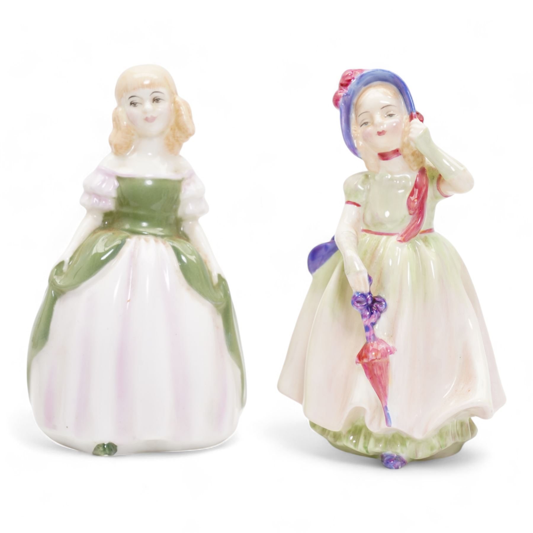 Royal Doulton figure, In the Stocks, HN2163,  H15cm, and four other Royal Doulton figures, To Bed HN1805, Babie HN1279, Wendy HN2109 and Penny HN2328 (second) (5)