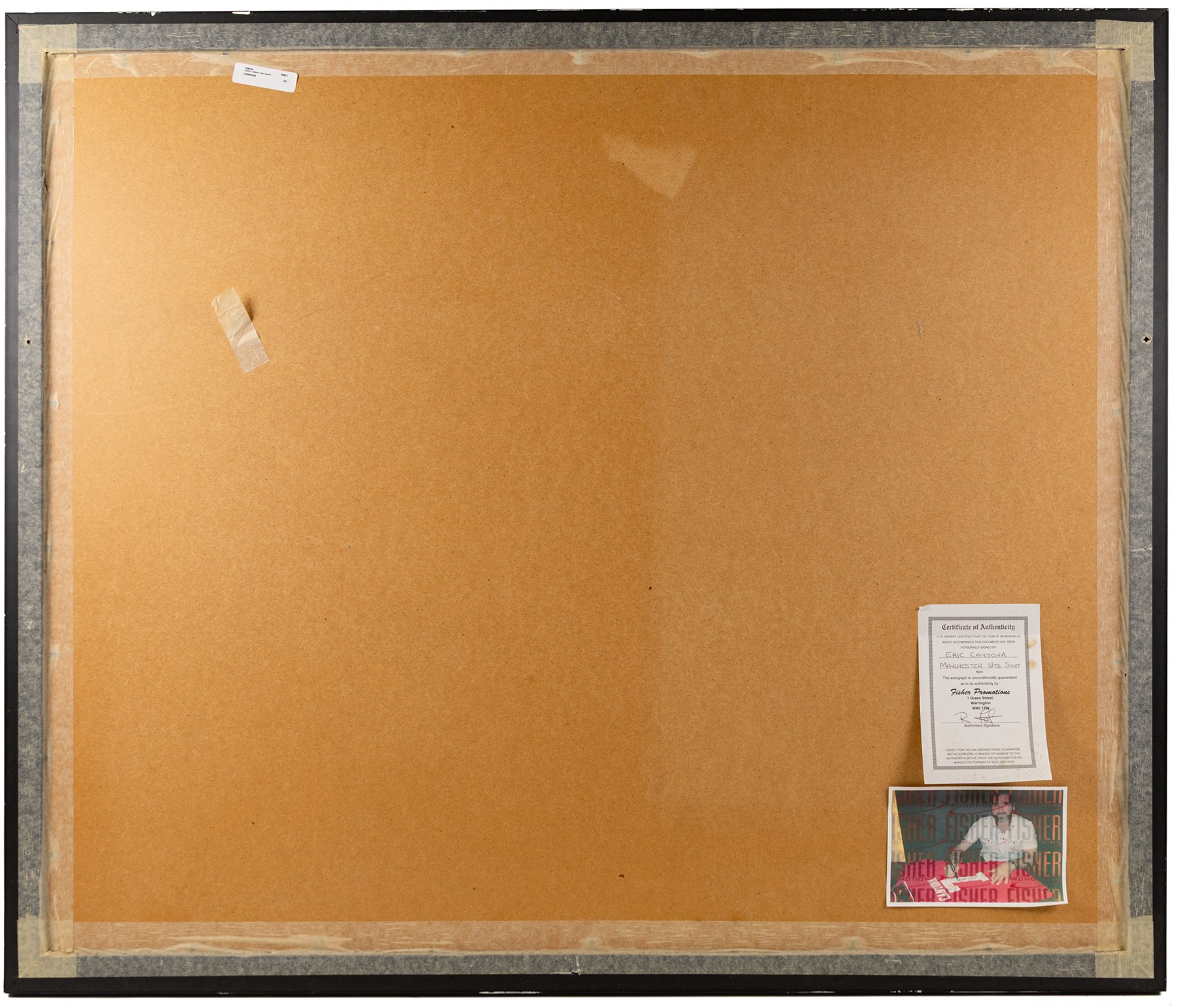 Signed Eric Cantona shirt, framed within a montage of iconic photographs from his Manchester United career, the shirt signed in black marker to the number, with certificate of authenticity from Fisher Promotions, frame H83cm
