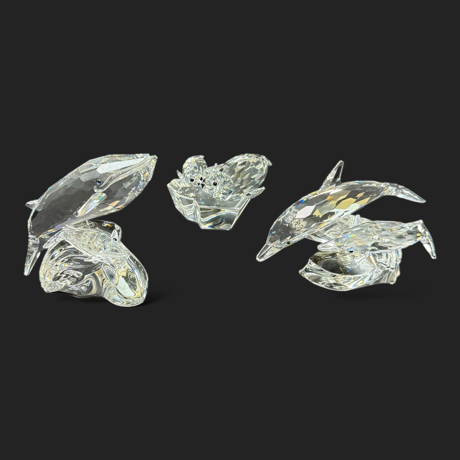 Three limited edition Swarovski Crystal figures, Care For Me, Save Me and Lead Me, all boxed with certificates 