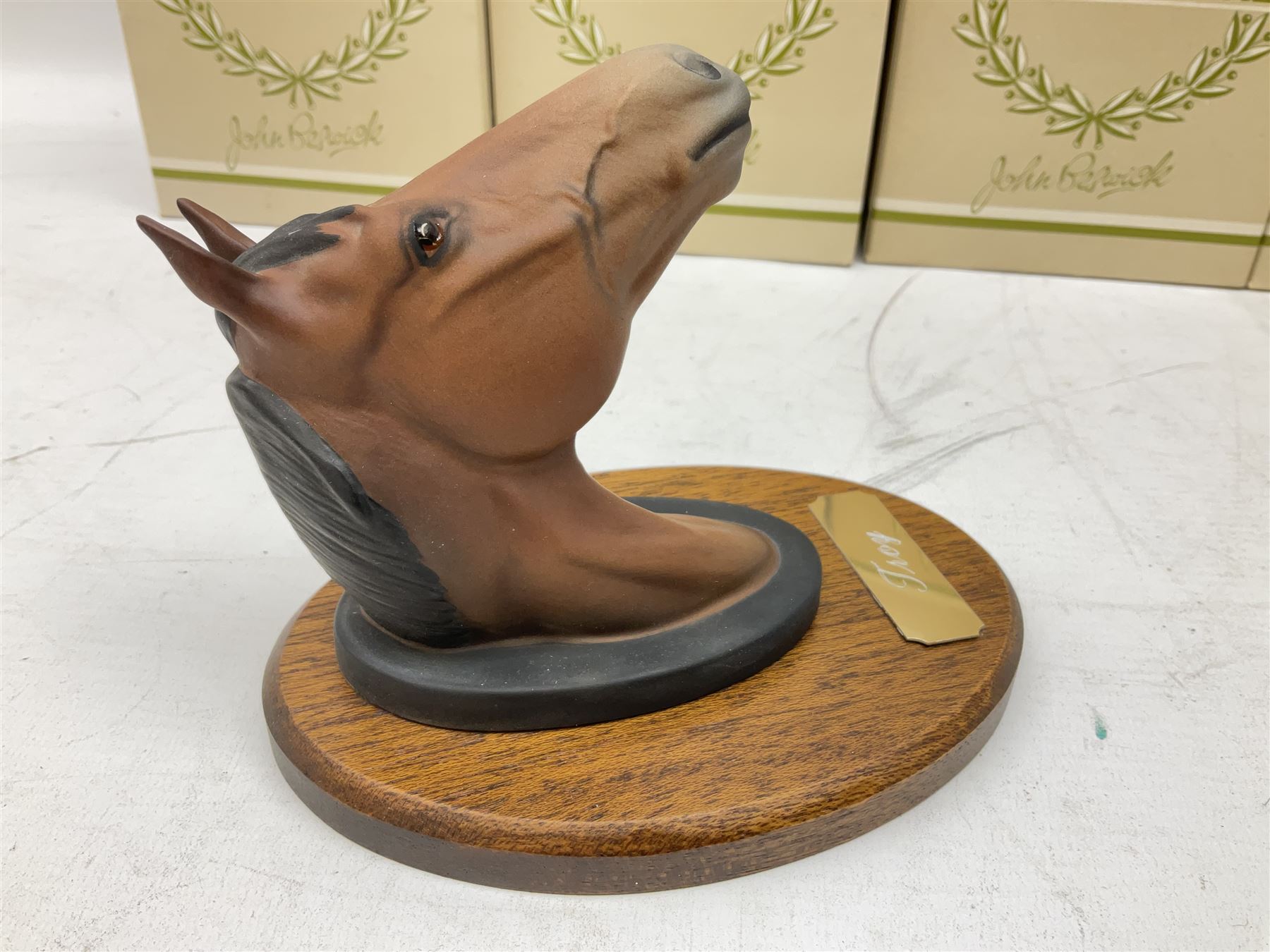 Beswick set of horse head wall plaques 'Champions all', comprising Arkle no.2700, The Minstrel no.2701, Red Rum no.2702, Troy no.2699, all with original boxes