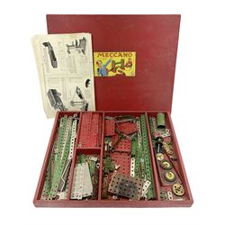 Meccano Set No.5 wooden box containing quantity of predominantly red and green sections, parts, brackets, wheels etc and instruction booklet