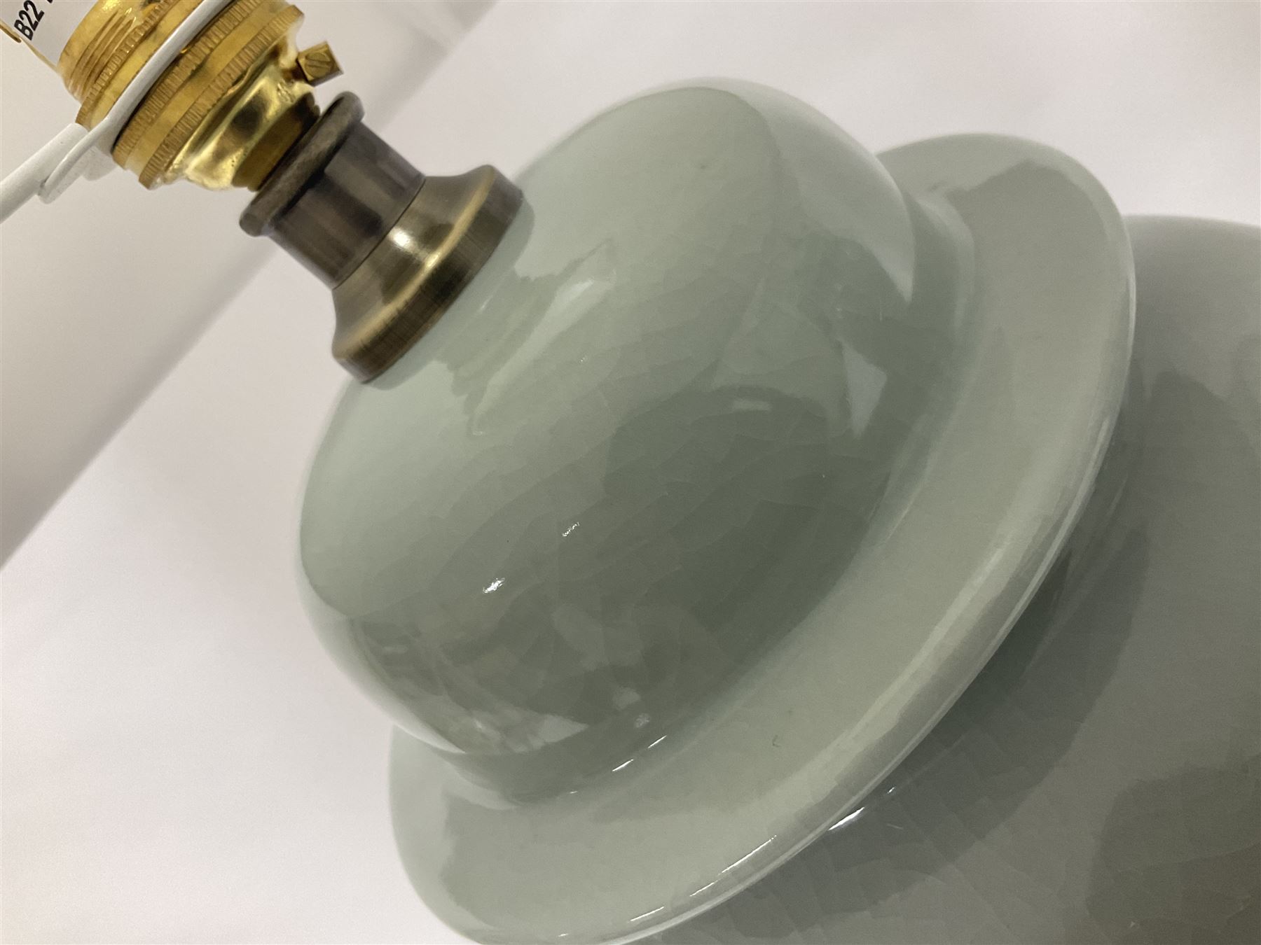 Pair of table lamps of baluster form, with a crackle glaze over a pale blue ground, including shade H68cm
