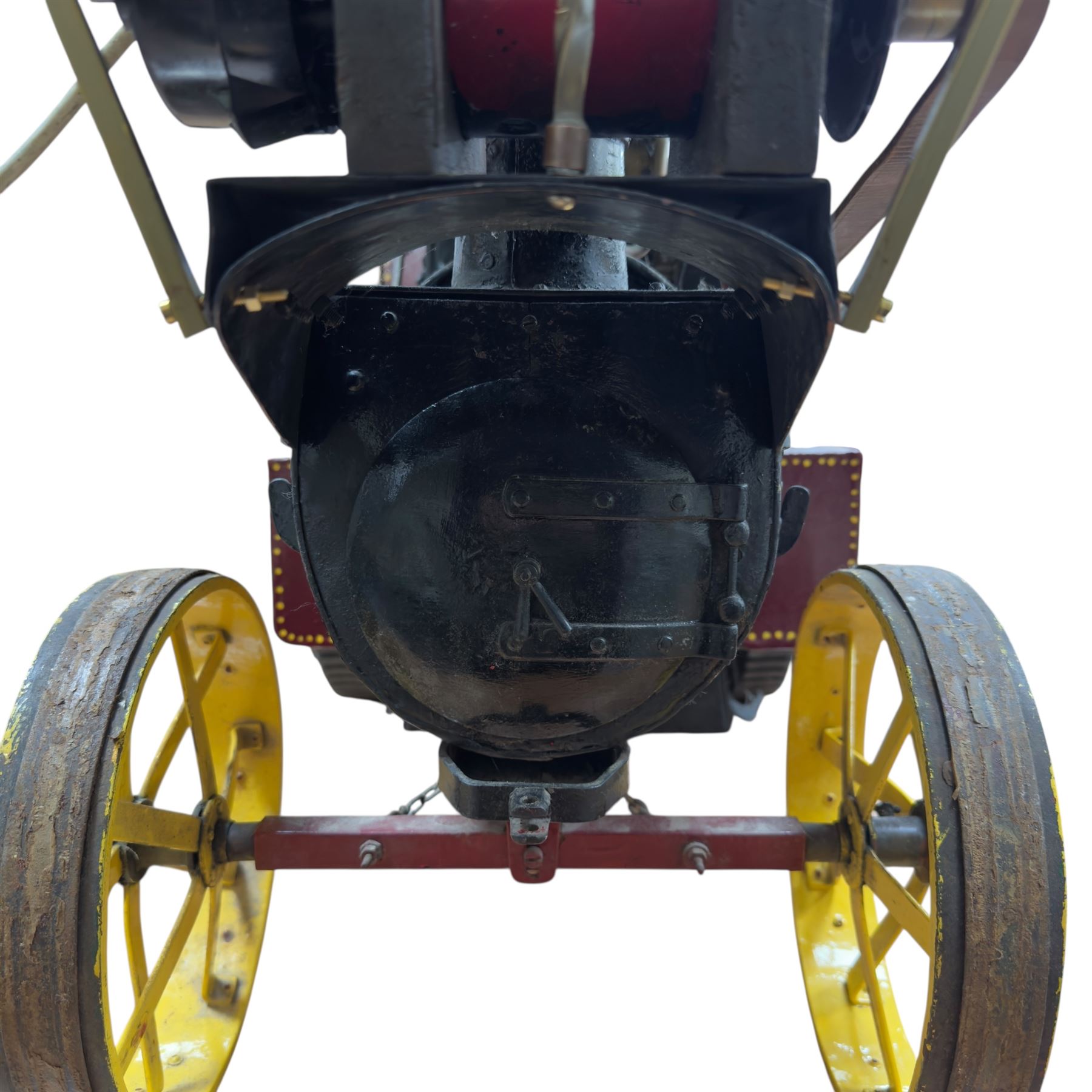 Mid-20th century scratch-built red and yellow painted live-steam scale model of a Showman's Traction Engine, 'Supreme' S.A. Oates & Sons, the simulated full length planked wooden canopy with brass supports and rope edging, with regulator, hand brake, chain steering , dynamo and water feed controls 19cm flywheel, 32cm diameter rear wheels with solid rubber tyres and 21cm diameter front wheels L102cm; together with scratch-built ride-on two-wheel trailer L58cm, and various brass rally plaques for 1980s/1990s.
This is a large, most interesting and comprehensive live-steam working model in need of re-furnishment and some repairs, the boiler has not been tested.