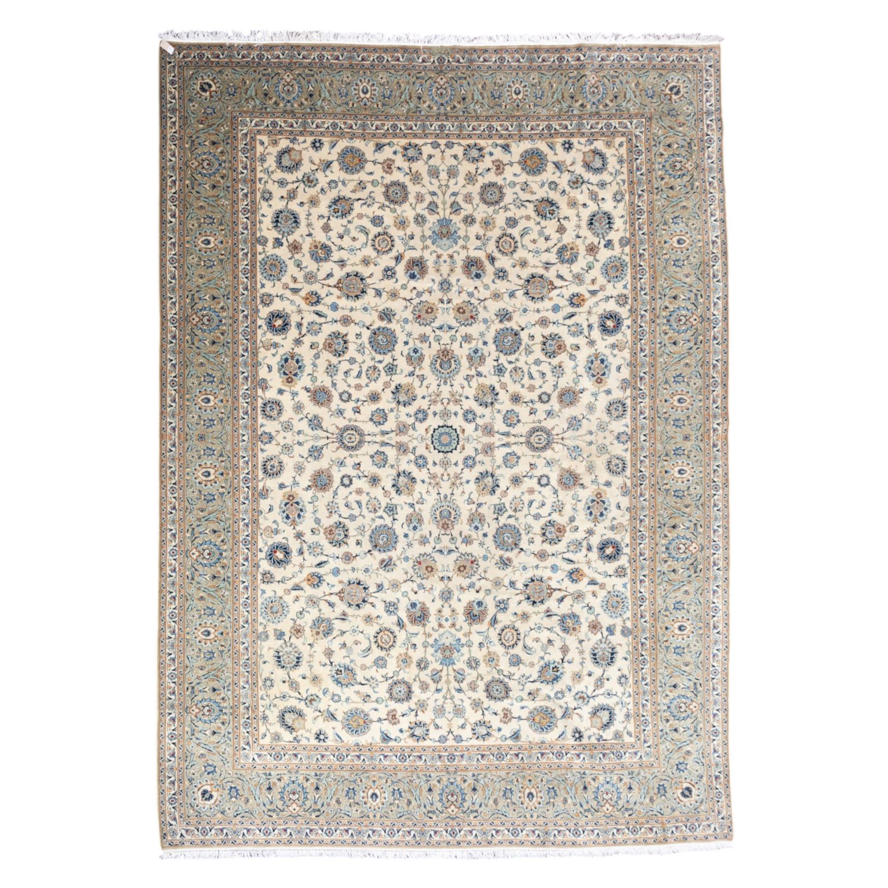 Large Central Persian Kashan hand-knotted carpet, ivory field with small central floral medallion issuing an all-over design of palmettes, rosettes, and scrolling vines enclosed by a complimentary foliate border framed by guard stripes, in a palette of ivory, power blues, and muted polychrome tones, with cotton fringe ends 