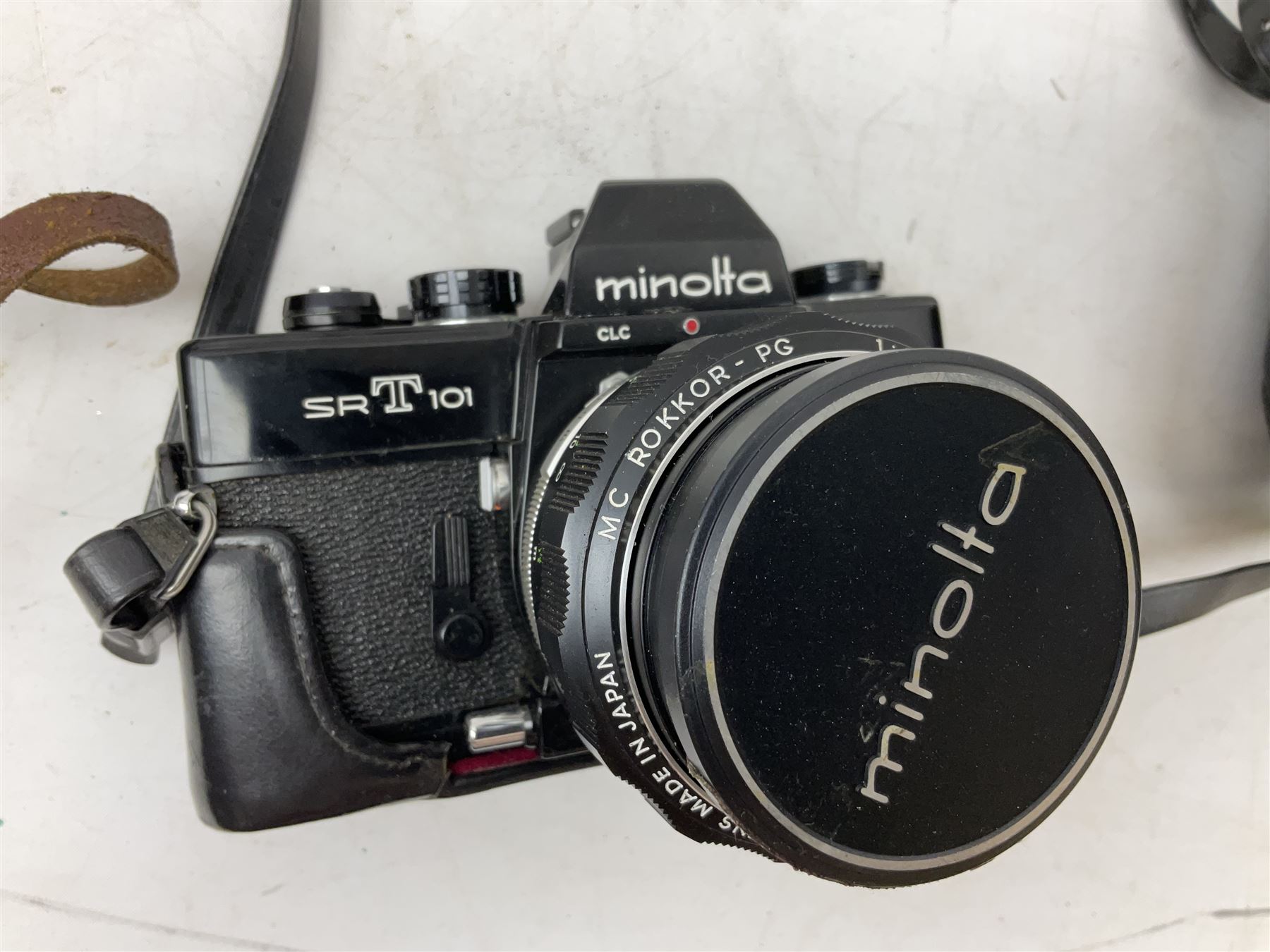 Minolta SRT101 camera, together with Halina camera, Fujifilm DX-8, Canon digital IXUS 1001S and other cameras and accessories 