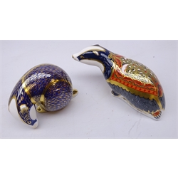  Two Royal Crown Derby paperweights: Moonlight Badger designed exclusively for the Royal Crown Derby Collectors Guild dated 2002 and another Badger dated 1986, gold stoppers (2)  