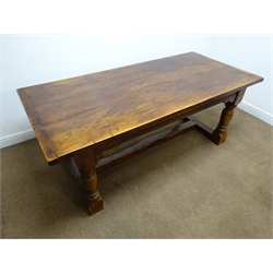  17th century style oak Refectory table, cleated planked top with moulded frieze on ring turned and block supports joined by a floor stretcher, L198cm, W92cm, H80cm   
