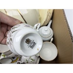 Royal Albert Masquerade pattern tea service for six, together with Royal Albert Dogwood pattern teacup and saucer and Alfred Meakin tea and dinner wares decorated with gilt on cream ground to include lidded tureens and oval serving plates etc in two boxes