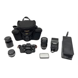 Nikon F3 SLR camera, serial number 1583609; Nikon 50mm 1:1.8 lens; Nikon 28-85mm 1:3.5-4.5 zoom lens; Vivitar MC 2X-3 Tele Converter, and a Nikon Speedlight SB-16 flash