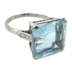 White gold and platinum square cut aquamarine ring, the aquamarine measuring approx 13mm x 12.5mm x depth of approx 9.5mm, with diamond set shoulders, stamped Plat 18c