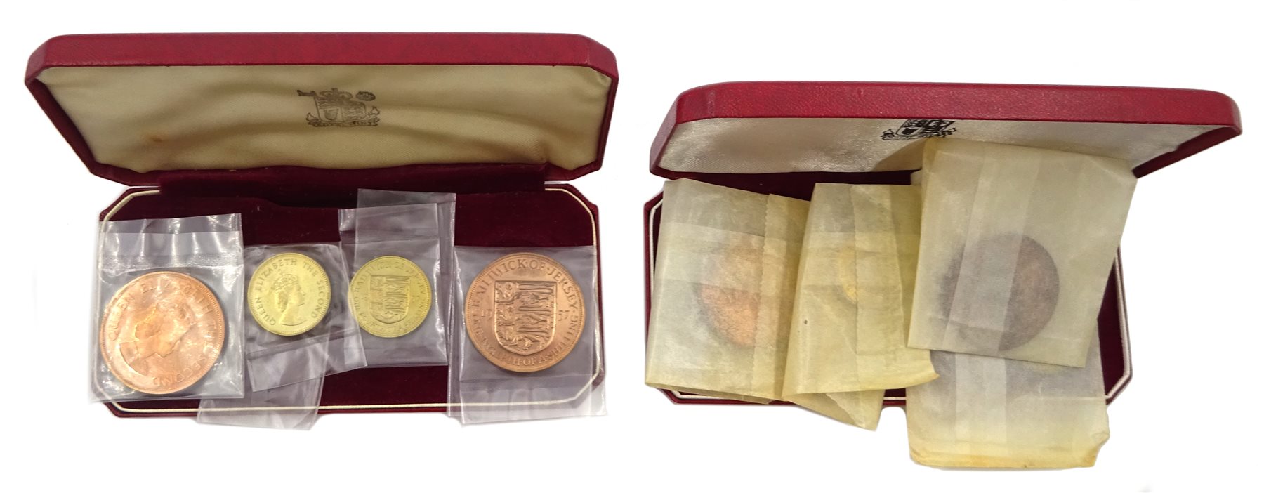  Bailiwick of Jersey 1957 cased four coin set and 1964 cased four coin set, Guernsey 1966 cased four coin set and New Zealand 1967 decimal coins cased seven coin set with coins still sealed in plastic packaging (4)   