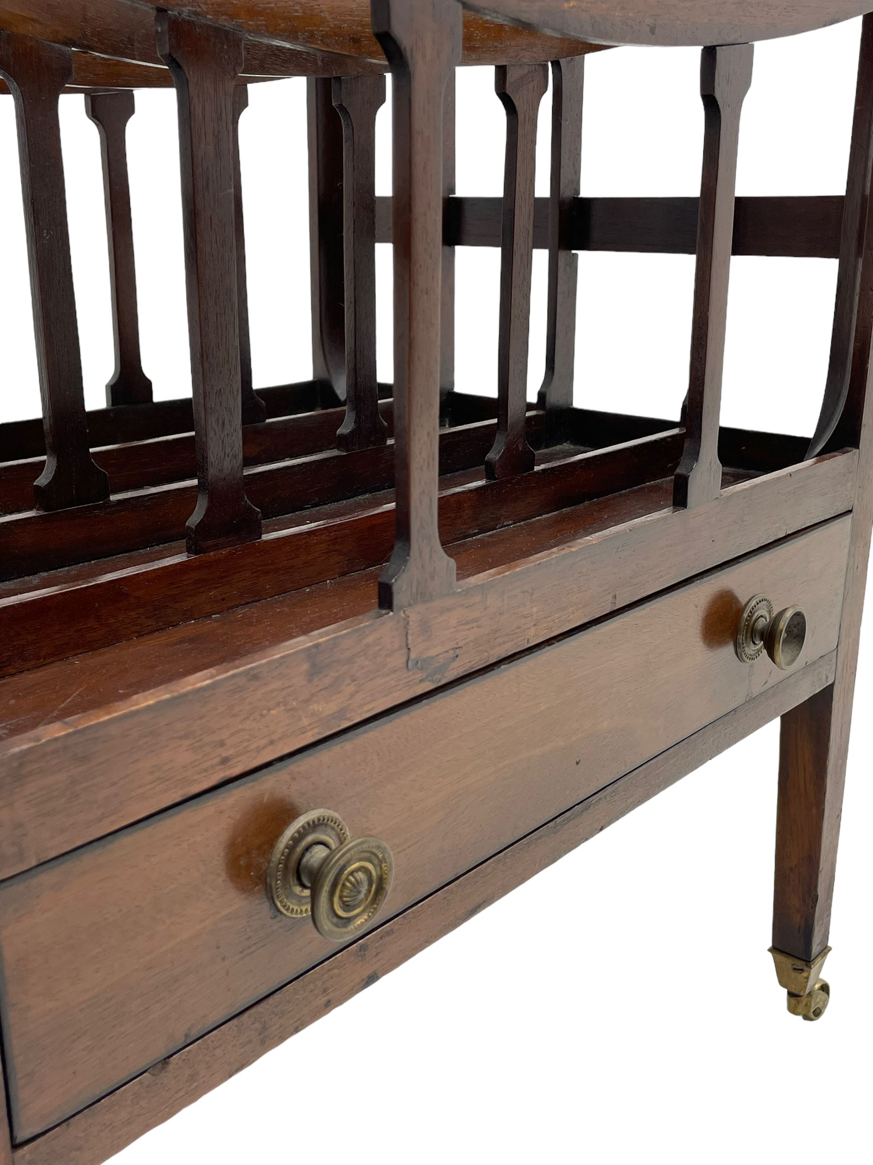 Georgian design mahogany Canterbury, four divisions with dished upper rails, the central rail pierced with handle, fitted with single drawer, on square supports with brass cups and castors 