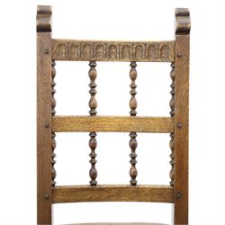 Rupert Griffiths for Monastic Woodcraft - oak 6ft refectory dining table with set six (4+2) matching chairs, rectangular top with arcaded frieze, with trestle base with further arcaded carved stretchers, chairs with carved rails and finials, leather wrapped seats with stud detail, turned supports united by carved stretcher