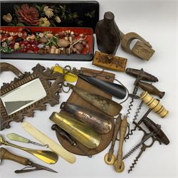 Miscellaneous collectors items - five 19th century and later cork screws including one with turned bone handle; carved sycamore butter roller; two pastry wheels; Strickland flask in leather case; costume jewellery in Victorian papier mache glove box; Black Forest hand mirror; various shoe horns and button hooks including silver handled etc