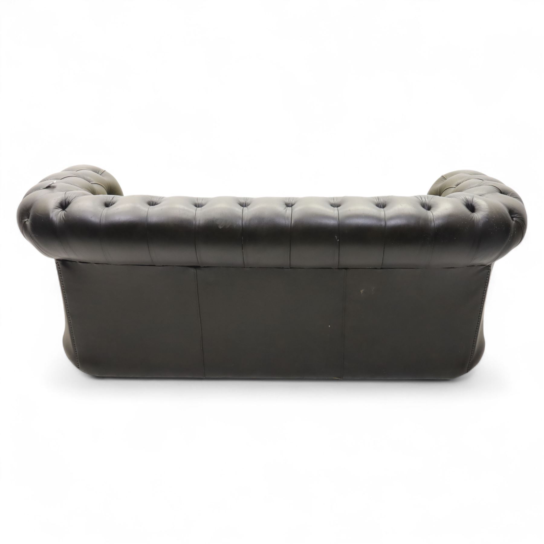 Chesterfield three seat sofa upholstered in green buttoned leather