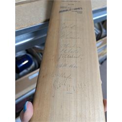 Two signed cricket bats, with signatures including Colin Cowdrey