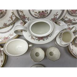 Royal Doulton Canton pattern tea and dinner wares comprising teapot, milk jug, twin handled lidded sucrier, cake plate, six dinner plates, six side plates, five smaller plates, five saucers and pair of candlestick holders, together with Sevres clear glass decanter with faceted sides and stopper, all with marks beneath